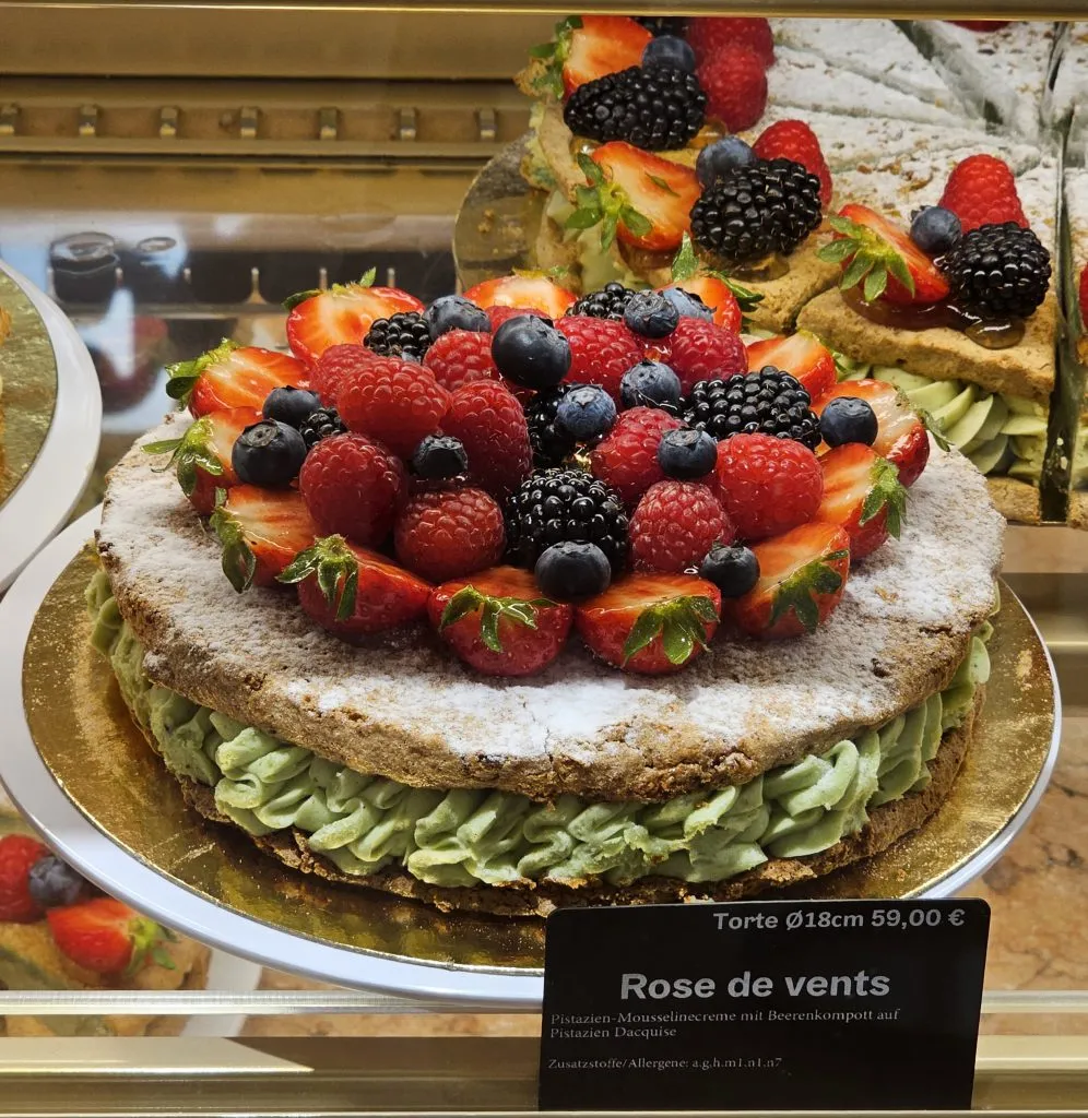 A stunning pistachio and summer berry creation from Lenôtre on the KaDeWe food floor