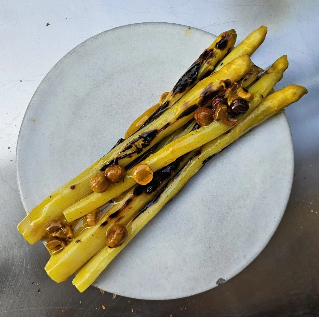 A beautifully plated course from the seasonal menu, showcasing the restaurant's modern presentation