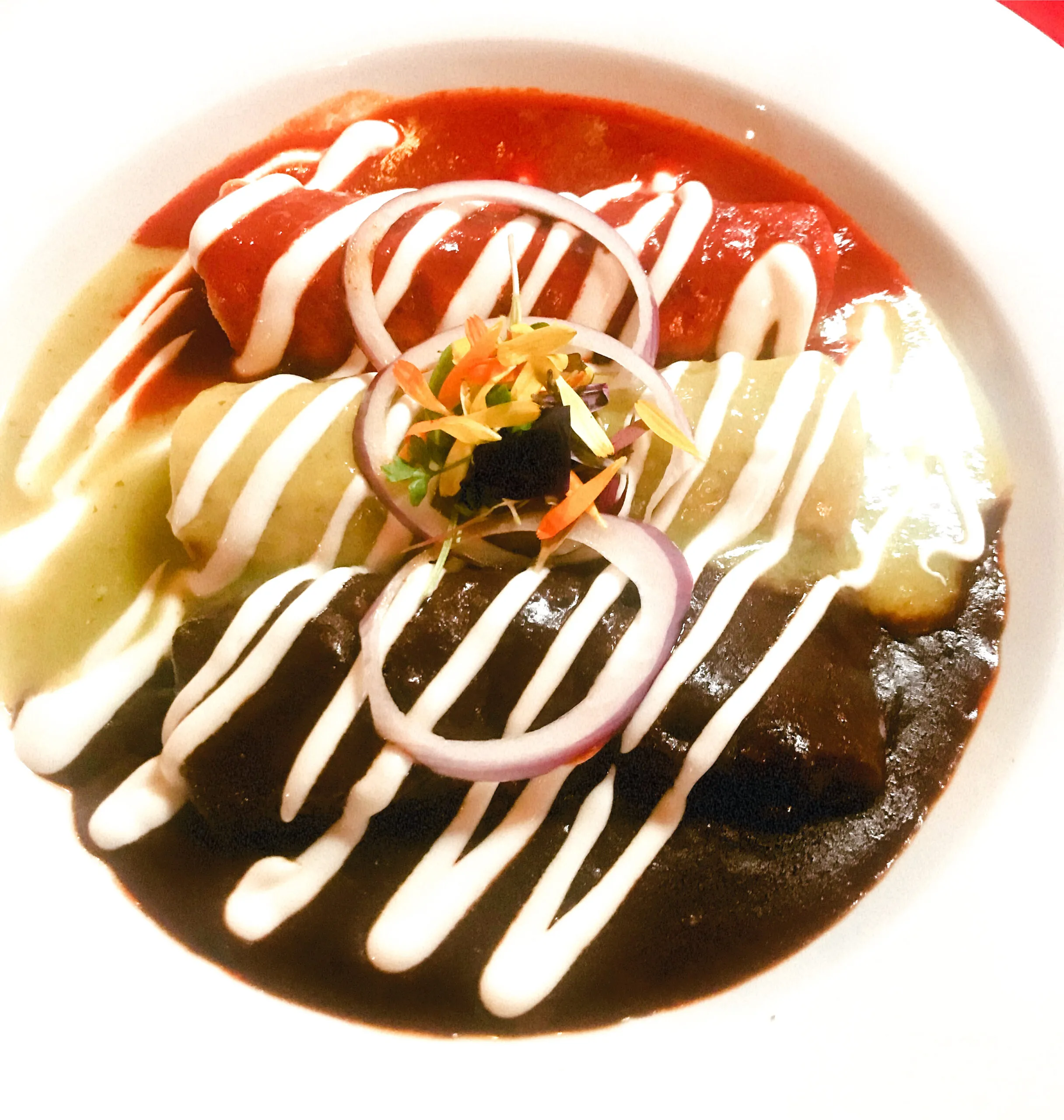 Enchilada Trio, a popular item on the tlaquepaque restaurant menu