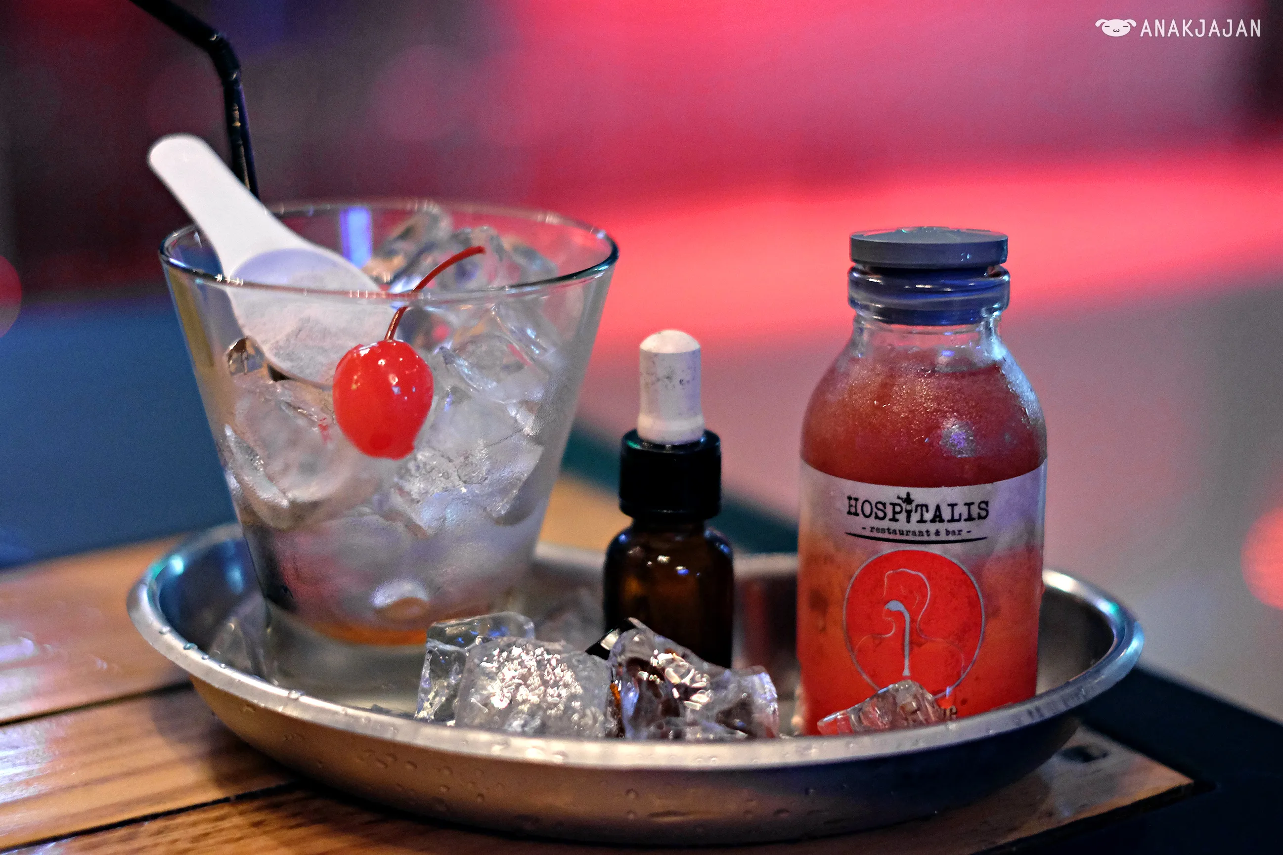 Virgin Coughing Removal mocktail presented in a unique vessel, highlighting the hospital theme