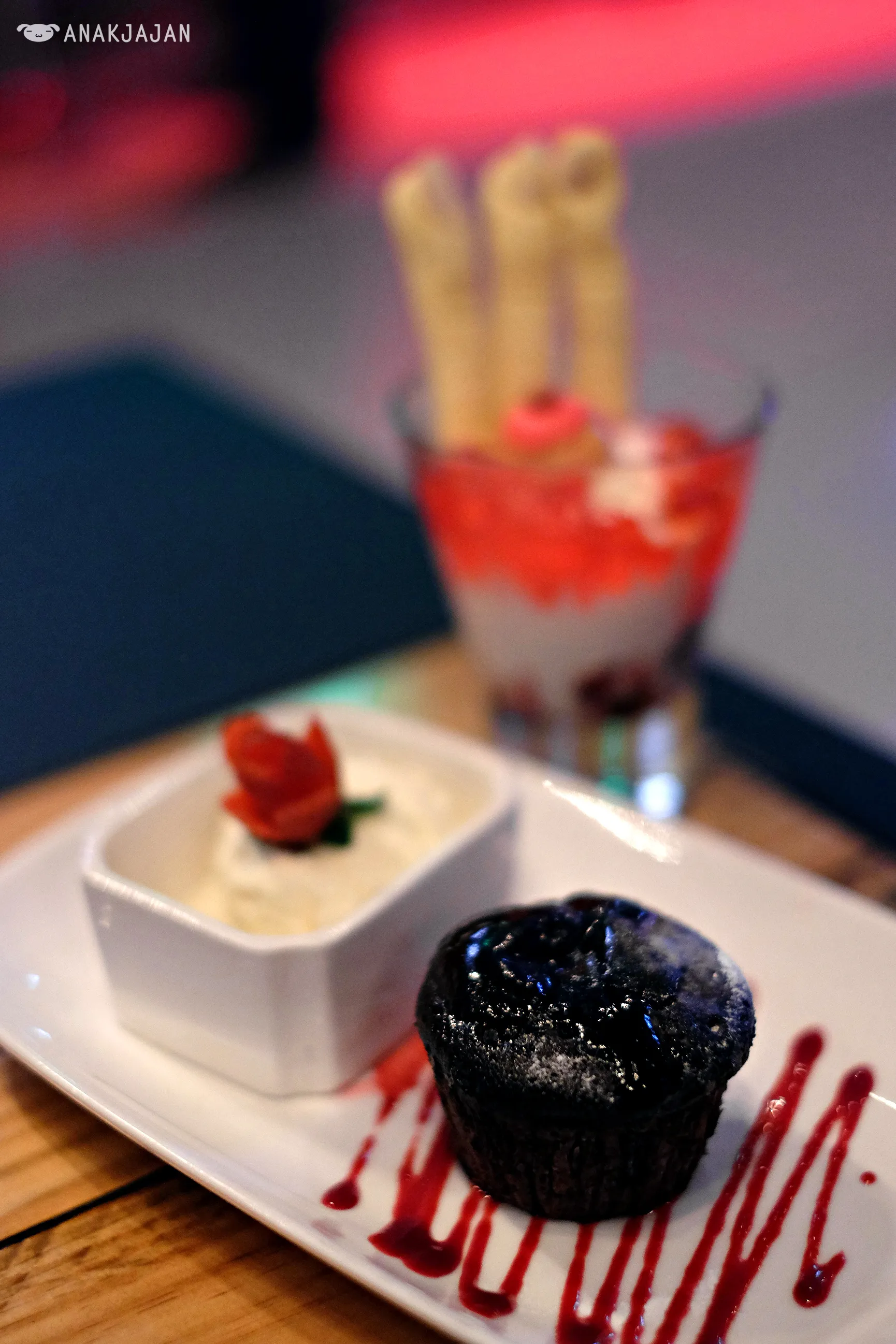Warm Fondant Au Chocolate cake served with ice cream and fresh strawberries