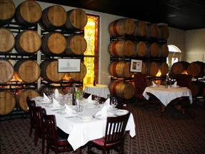 Messina Hof Winery building, possibly The Vintage House Restaurant, showcasing the rustic and elegant setting.