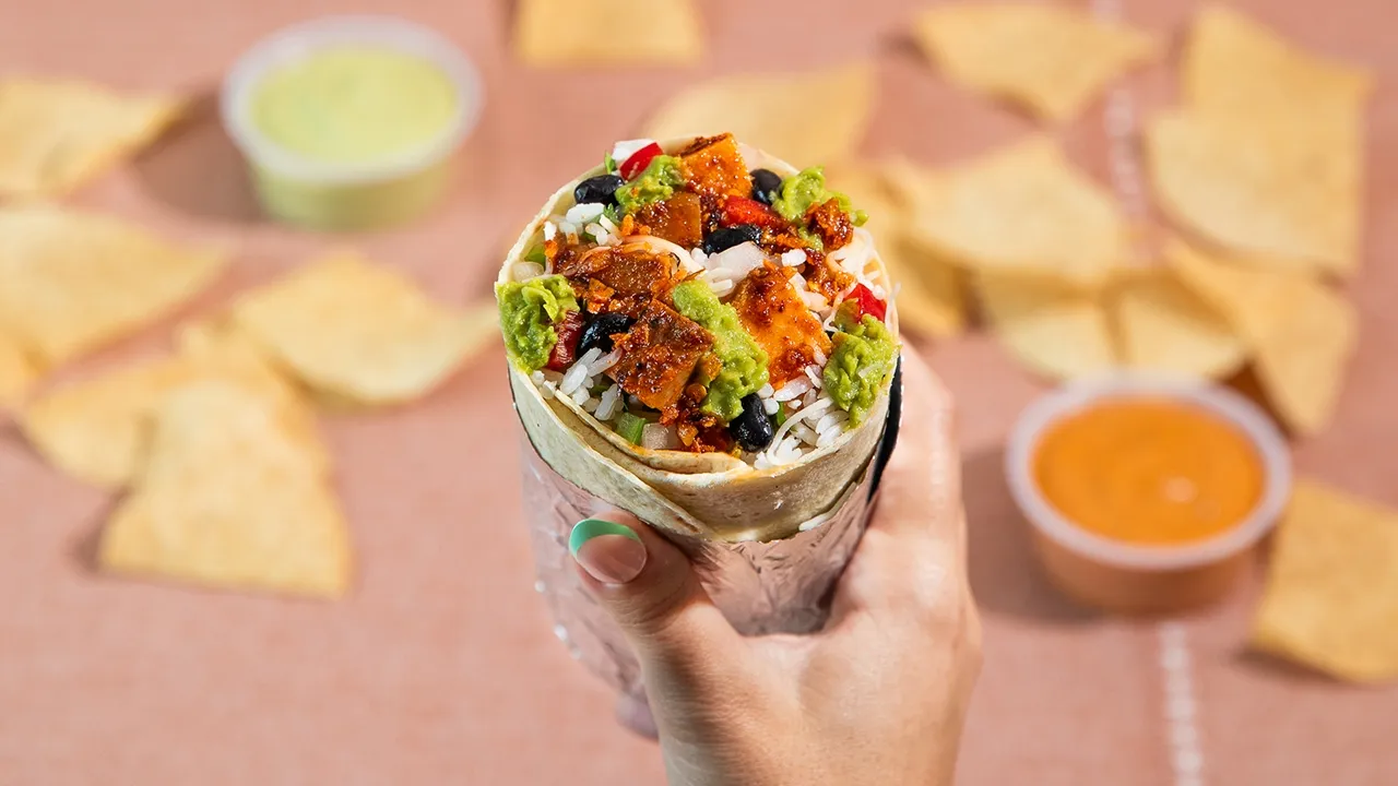 A promotional image of Moe's Southwest Grill Chili Crisp Chicken bowl, showcasing the LTO's integration into a mainstream Tex-Mex-style umami restaurant menu